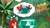 Size: 1513x850 | Tagged: safe, artist:lanthart, editor:lanthart, agent stone, knuckles the echidna, robotnik, echidna, human, sonic mania adventures, classic knuckles, daytime, edit, edited screencap, hand on chin, looking up, master emerald, outdoors, palm tree, sharp teeth, standing, thinking, thought bubble, tree, trio, water, waterfall