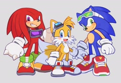 Size: 2048x1400 | Tagged: safe, artist:mossan315, knuckles the echidna, miles "tails" prower, sonic the hedgehog, echidna, fox, hedgehog, blushing, clenched fists, cute, goggles, goggles around neck, goggles on head, grey background, grin, knucklebetes, looking at viewer, mouth open, simple background, smile, sonabetes, sonic riders, standing, tailabetes, team sonic, trio