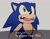 Size: 1023x796 | Tagged: safe, artist:dandimango, sonic the hedgehog, hedgehog, sonic adventure, dialogue, faic, fangs, gloves, grey background, looking up, male, mouth open, redraw, simple background, solo, standing