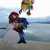 Size: 1250x1250 | Tagged: safe, artist:feliskitt, knuckles the echidna, miles "tails" prower, sonic the hedgehog, echidna, fox, hedgehog, abstract background, crossdressing, dress, falling, female, gay, holding each other, knuxonic, male, meme, nonbinary, ocean, redraw, shipping, smile, standing, suit, team sonic, third wheel, trans female, trans girl tails, transgender, trio, wedding