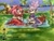 Size: 2048x1536 | Tagged: safe, artist:sum_more_smores, amy rose, blaze the cat, cat, hedgehog, 2023, alternate outfit, amy x blaze, blaze's tailcoat, blushing, cute, dress, duo, duo female, female, females only, food, grass, hands together, head tilt, holding something, kneeling, lesbian, loop, open smile, outdoors, palm tree, picnic, picnic basket, shipping, smile, smiling at each other, sun, sunflower, water