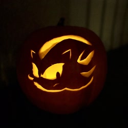 Size: 2048x2048 | Tagged: safe, artist:mistercrits, shadow the hedgehog, 2024, frown, halloween, irl, pumpkin, pumpkin carving, solo