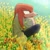 Size: 760x760 | Tagged: safe, artist:umerouge, knuckles the echidna, alternate outfit, alternate shoes, clothes, daytime, field, flower, flower field, frown, hoodie, looking offscreen, outdoors, pants, solo