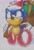 Size: 1688x2471 | Tagged: safe, artist:gruffdasmuff, sonic the hedgehog, hedgehog, 2024, christmas, christmas hat, classic sonic, classic sonic (universe), dic, hat, holding something, looking ahead, male, present, redraw, running, sack, signature, smile, snow, solo, sonic christmas blast