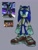 Size: 1536x2048 | Tagged: safe, artist:sheeru_2k, sonic the hedgehog, sonic riders: zero gravity, 2025, clenched fists, gravity band, grey background, looking offscreen, mouth open, redraw, reference inset, simple background, solo, standing