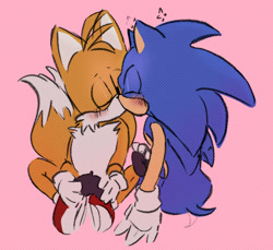 Size: 709x650 | Tagged: safe, artist:m27pb, miles "tails" prower, sonic the hedgehog, 2025, age difference, blushing, controller, duo, eyes closed, gaming, gay, holding something, kiss, pink background, shipping, simple background, sitting, sonic x tails