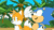 Size: 500x281 | Tagged: safe, miles "tails" prower, sonic the hedgehog, sonic mania adventures, abstract background, animated, beach, classic sonic, classic tails, coconut, daytime, duo, edit, eyes closed, fistbump, gif, looking at each other, looking offscreen, outdoors, palm tree, screencap, smile, tree, wink