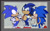 Size: 812x499 | Tagged: safe, artist:holidaymidi, sonic the hedgehog, hedgehog, adventures of sonic the hedgehog, sonic underground, 2025, abstract background, backpack, classic sonic, clenched teeth, frown, hands on hips, looking at each other, pointing, self paradox, sonic satam, standing, sweatdrop, trio
