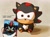 Size: 1611x1182 | Tagged: safe, artist:waaii132299, shadow the hedgehog, 2025, chinese text, english text, holding something, sega cooro, solo, sonic racing crossworlds, stuffed animal