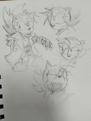 Size: 1536x2048 | Tagged: safe, artist:pointedconflict, amy rose, hedgehog, 2026, angry, expression sheet, eye clipping through hair, female, fleetway, fleetway amy, frown, line art, monochrome, pencilwork, sketch, smile, solo, traditional media