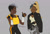 Size: 1076x725 | Tagged: safe, artist:astrophysician, tangle the lemur, whisper the wolf, human, 2026, cleavage, dark skin, duo, ear piercing, earring, flat colors, grey background, holding something, humanized, idw sonic the hedgehog, looking at each other, signature, simple background, smile, species swap, standing, thumbs up