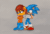 Size: 800x536 | Tagged: safe, artist:sebas289377, sally acorn, sonic the hedgehog, chipmunk, hedgehog, hybrid, squirrel, 2026, animated, archie sonic the hedgehog, blushing, catch, duo, female, frame by frame, gif, holding them, male, pencilwork, sally x sonic, sally's vest and boots, shipping, simple background, straight, sweatdrop, throwing, traditional media