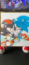 Size: 944x2048 | Tagged: safe, artist:bb_meronpan, shadow the hedgehog, sonic the hedgehog, 2025, duo, gay, grin, hand on another's shoulder, hand on ground, kneeling, looking at each other, looking at them, markerwork, shadow x sonic, shipping, simple background, sitting, smile, traditional media, white background, wink