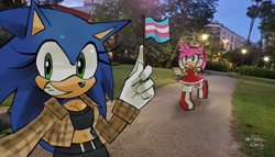 Size: 2047x1173 | Tagged: safe, artist:abby_ramy, amy rose, sonic the hedgehog, 2026, amy x sonic, bisexual, duo, duo female, female, females only, flag, half r63 shipping, lesbian, photographic background, pride, pride flag, pride month, shipping, signature, smile, trans female, trans girl sonic, trans pride, transgender