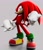 Size: 1779x2048 | Tagged: safe, artist:gameguybenn, artist:garbonzobeanguy, knuckles the echidna, echidna, 2026, 3d, clenched fists, clenched teeth, grey background, looking at viewer, male, sharp teeth, simple background, smile, smiling at viewer, socks, solo, standing