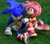 Size: 1766x1547 | Tagged: safe, artist:dokatzo, artist:gameguybenn, artist:luuvu2112, amy rose, sonic the hedgehog, hedgehog, 3d, amy x sonic, duo, grass, looking up, shipping, sitting, soap shoes, straight, treads